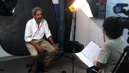 man being interviewed using a lavalier microphone