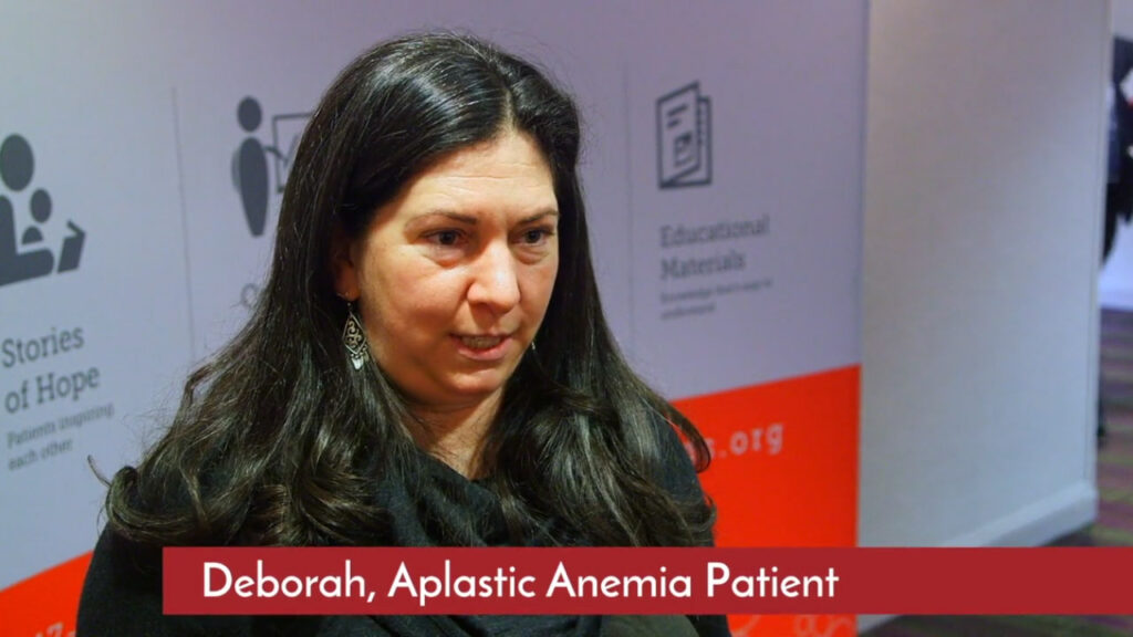 Aplastic anemia patient sharing experience at healthcare conference in storytelling video