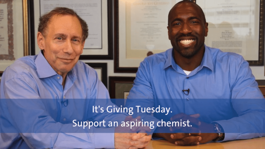 Bob Langer and Keith Reed in professional attire for a Giving Tuesday fundraiser produced by MiniMatters video services.