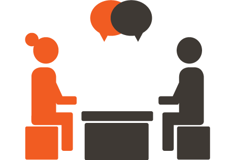orange and black icon of two people having a conversation at a table