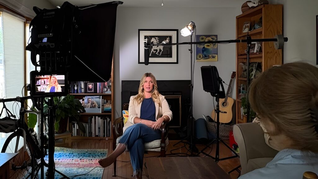 Women sitting on a chair in a room getting recorded and interviewed | video production Washington DC