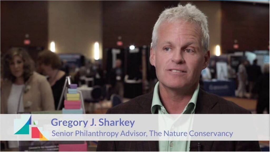 Gregory J. Sharkey sharing nonprofit philanthropy insights in conference interview video