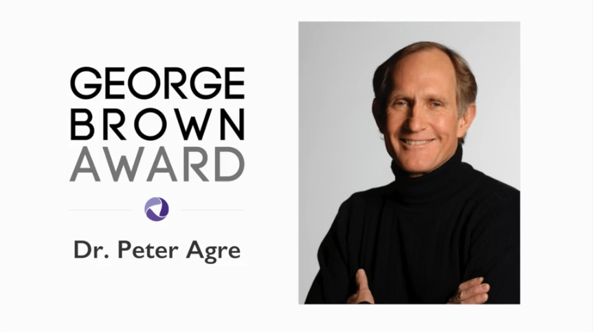 A promotional graphic for the George Brown Award featuring a headshot of Dr. Peter Agre alongside the award title and logo.