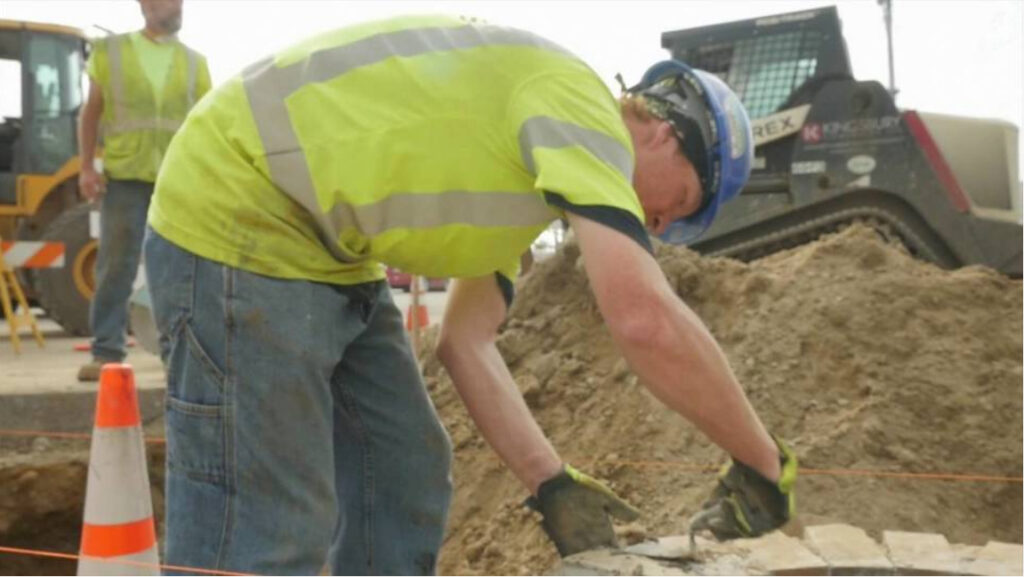 Construction worker employed through social impact job program in workforce development video