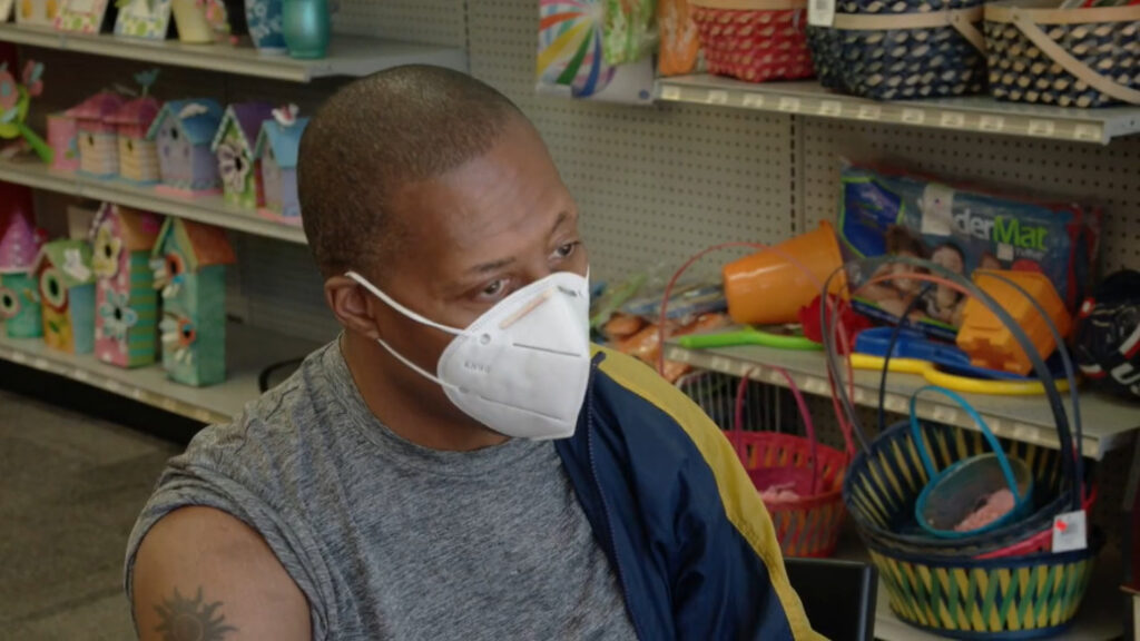 African American COVID-19 vaccination video featuring Black patient getting vaccinated at Flexcare Pharmacy