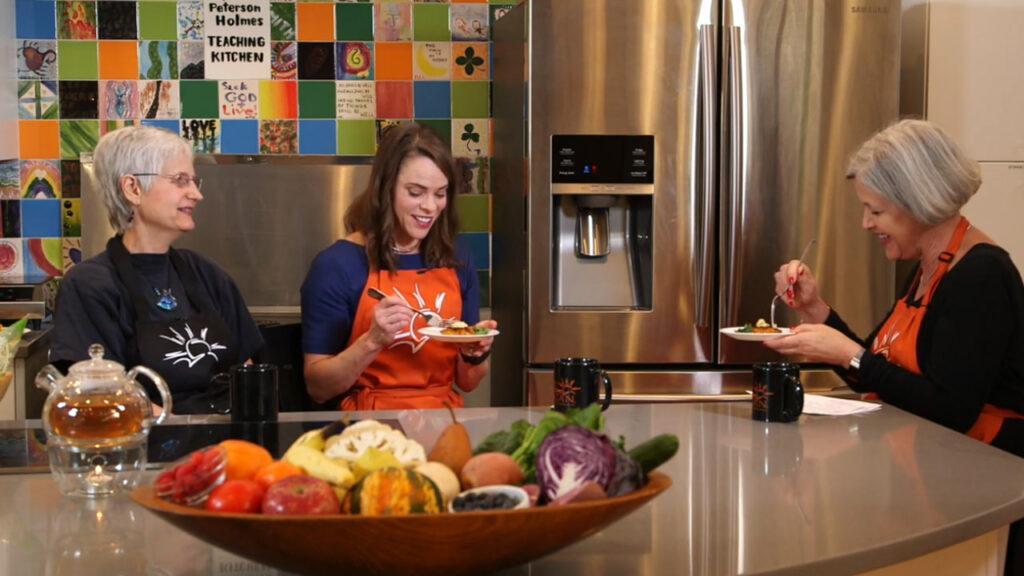 thumbnail for a patient education video featuring nutrition experts tasting healthy food in bright kitchen