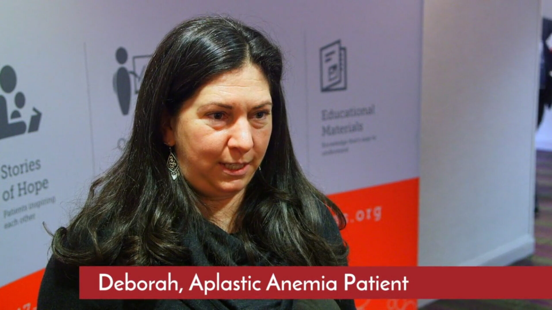 Aplastic anemia patient sharing experience at healthcare conference in storytelling video