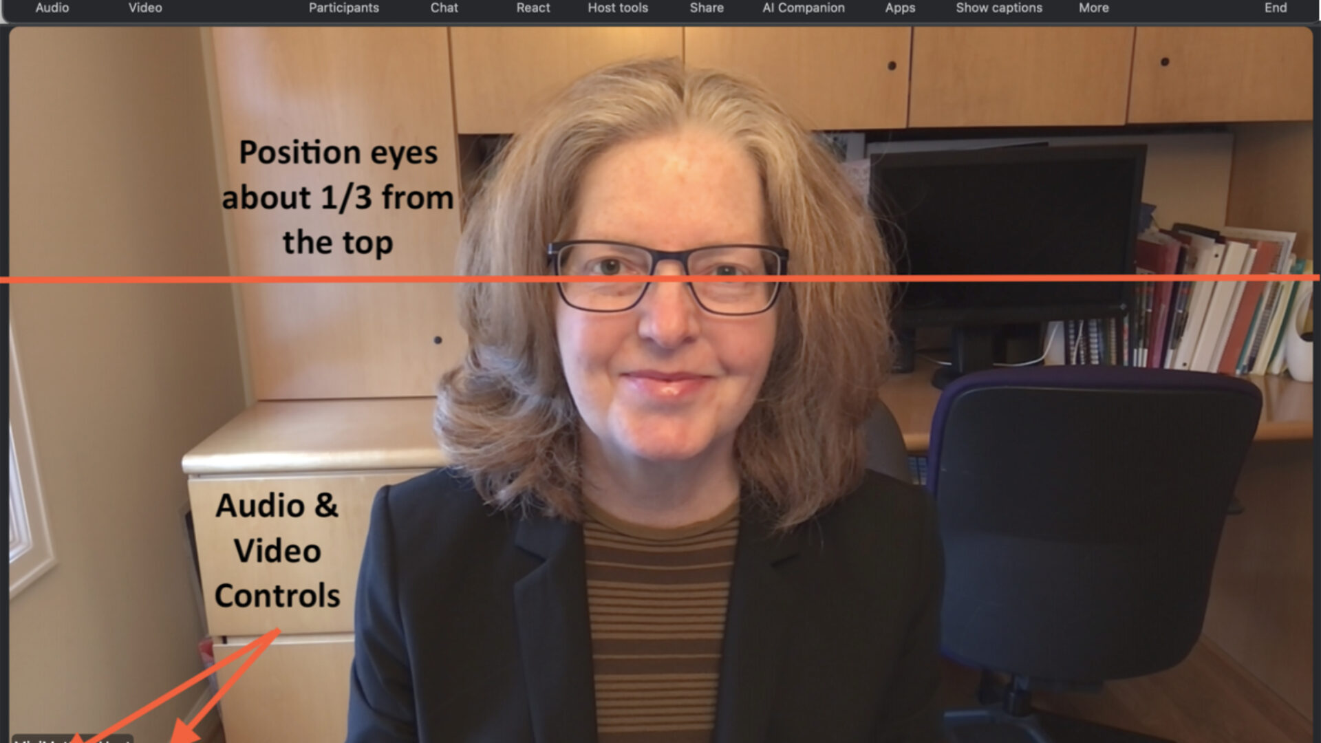 Woman in a Zoom recording showing the best position to frame a person's face on screen and video and audio controls one of 20 tips to look and sound your best in a Zoom video recording