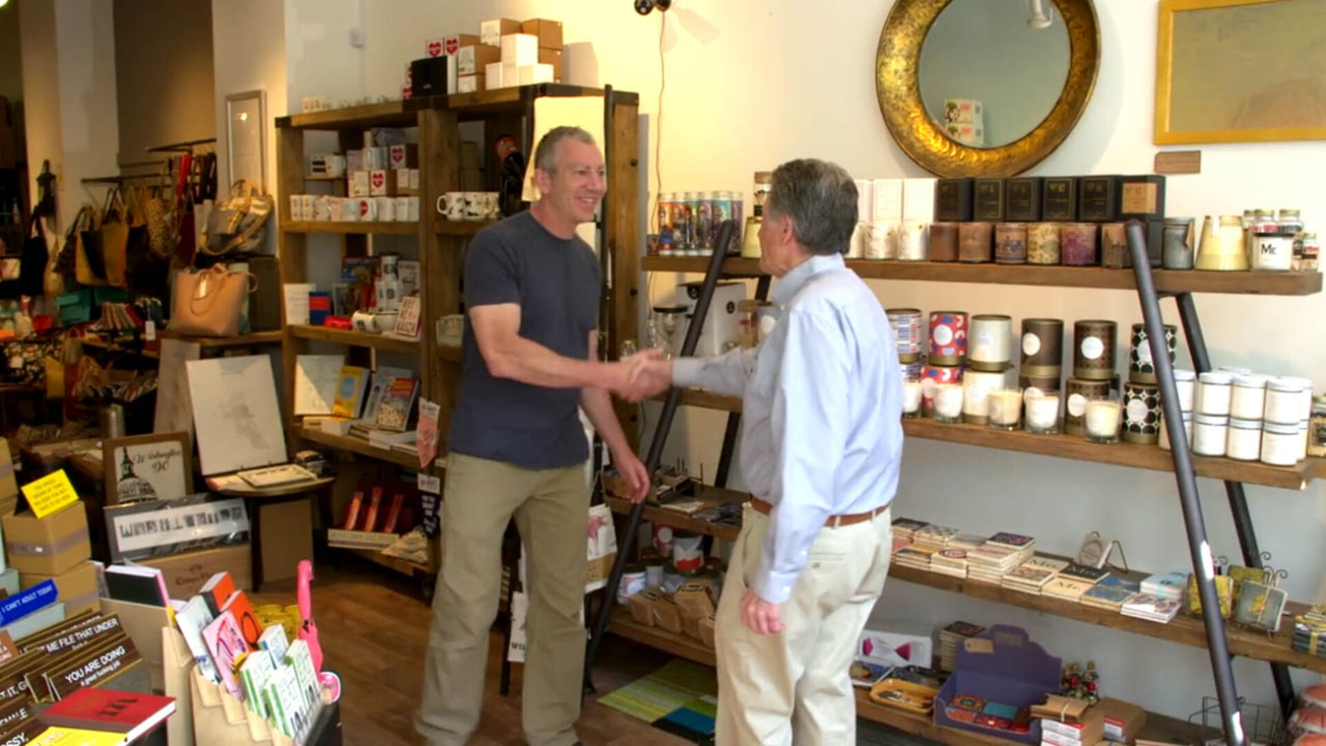 thumbnail of Urban Dwells owner Tom McMahon and SCORE mentor Richard Rose shaking hands in Veteran Award Video